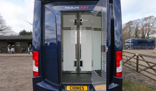 blue 3.5 ton horsebox rear view door open