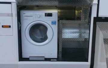 Washing machine stored in tack locker